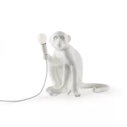 THE MONKEY LAMP SITTING...