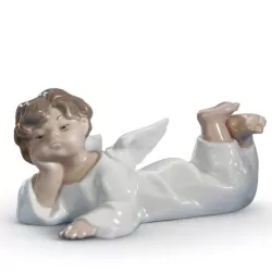 FIGURINE ANGLE LAYING DOWN...