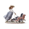 PUPPY PARADE GIRL WITH DOGS FIGURINE 1006784